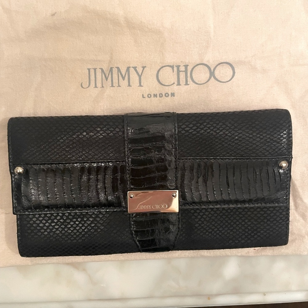 Jimmy Choo Black Snakeskin Clutch. Gorgeous!  Chic.  Unique!
